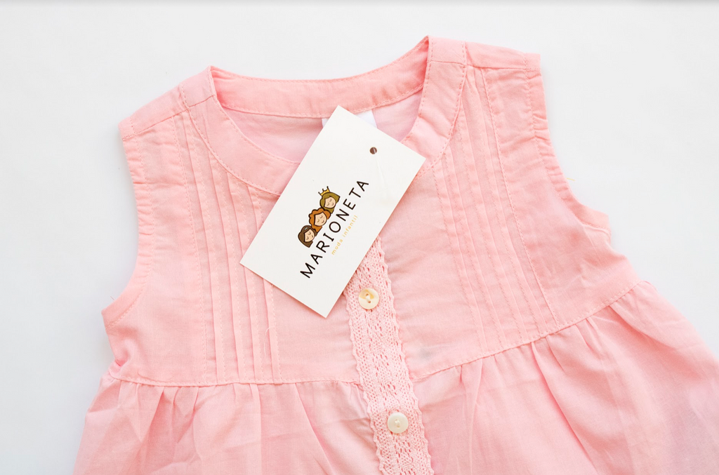 Vestido rosa con detalles al frente sin mangas para bebe niña | Newness