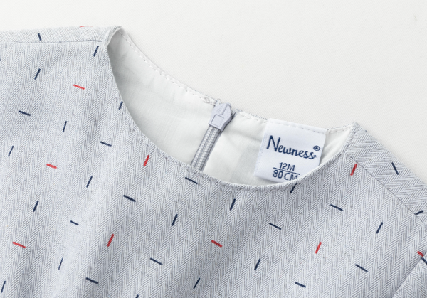 Vestido gris manga larga con falda de tul y detalle de caramelos color gris para bebe niña | Newness
