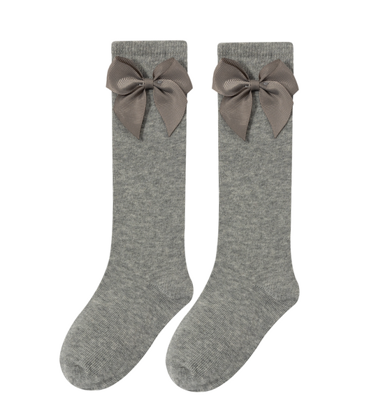 Medias con detalle de lazo color gris claro para niña | Newness lo