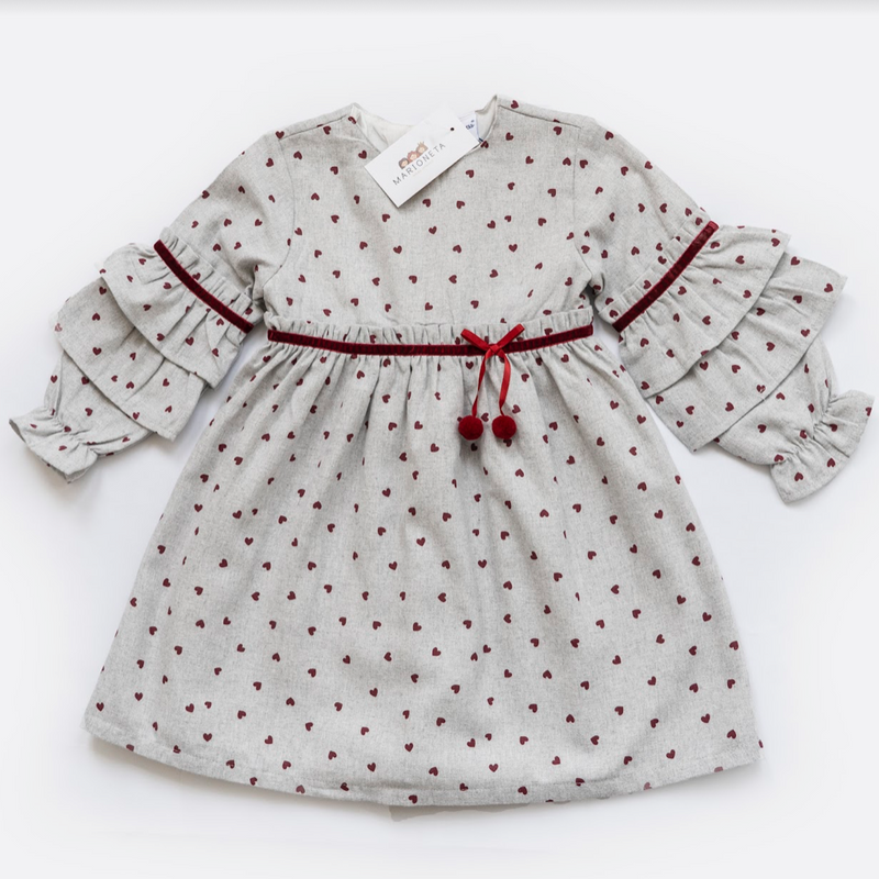 Vestido gris con estampado de corazones y adorno liston terciopelo para bebe niña | Newness