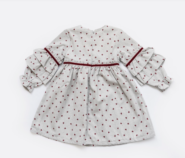 Vestido gris con estampado de corazones y adorno liston terciopelo para bebe niña | Newness