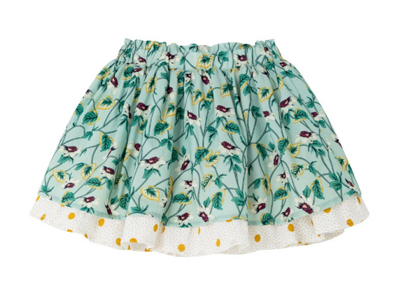 Conjunto dos piezas falda estampada verde y blusa blanca con bolas amarillas y adorno en mangas para niña | Newness
