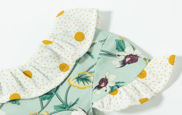 Vestido con braguita de fiesta verde con flores del color lila para bebe niña | Newness