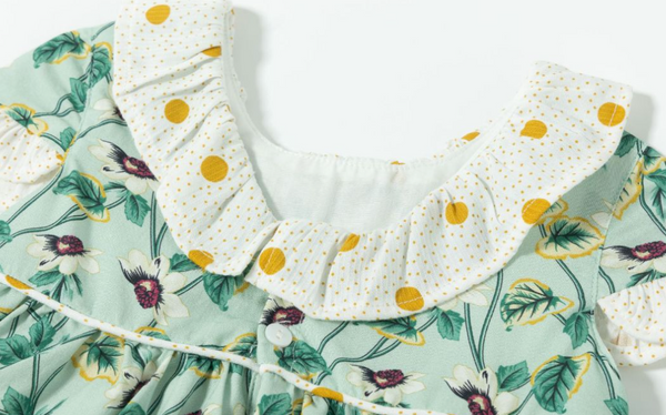 Vestido con braguita de fiesta verde con flores del color lila para bebe niña | Newness
