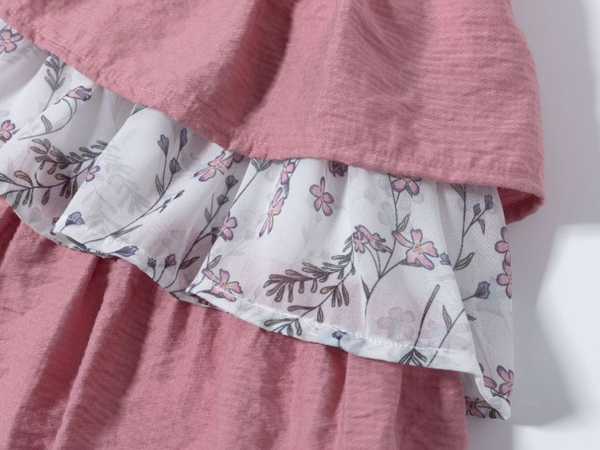 Vestido de vestir  rosa con tejido blanco con flores rosas y lazo por la parte de atras para niña | Newness