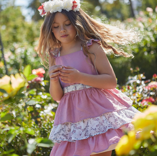 Vestido de vestir  rosa con tejido blanco con flores rosas y lazo por la parte de atras para niña | Newness