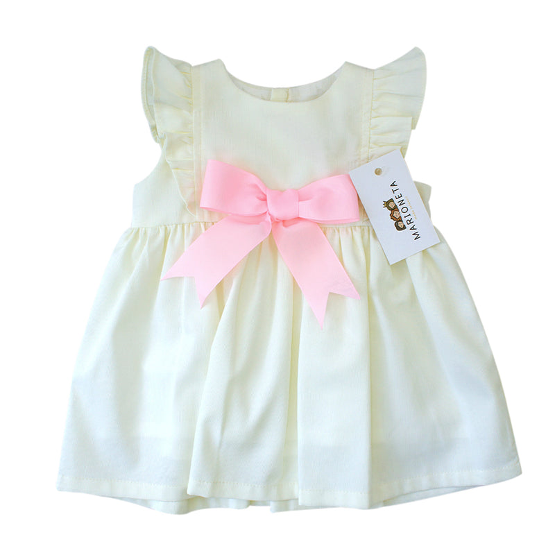 Vestido color beige amarillo con moño color rosa para bebé niña| Tina y Mar