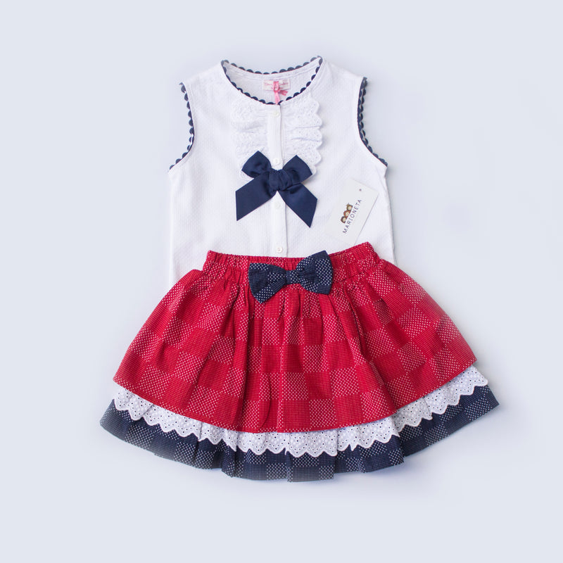 Conjunto dos piezas falda color rojo con azul marino y playera color blanco para niña| Newness