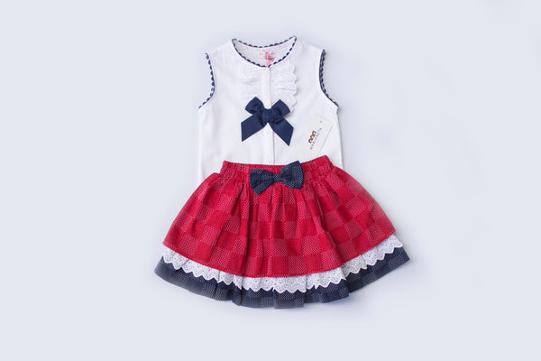 Conjunto dos piezas falda color rojo con azul marino y playera color blanco para niña| Newness