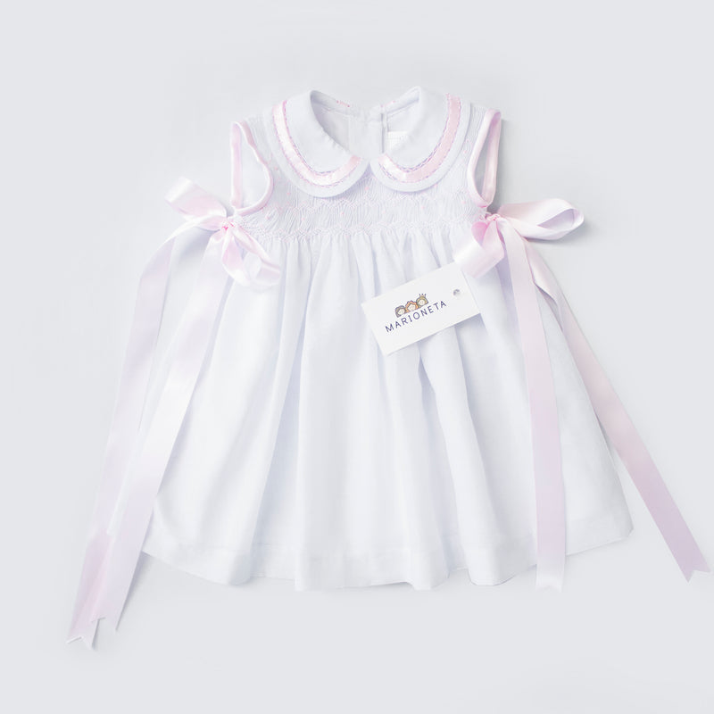 Vestido bordado color blanco con moños color rosa para bebé/niña| Carpi