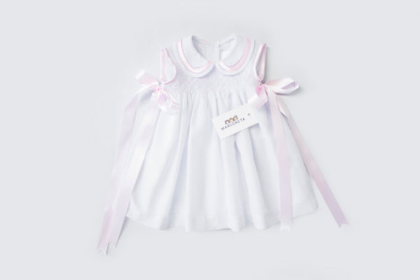 Vestido bordado color blanco con moños color rosa para bebé/niña| Carpi