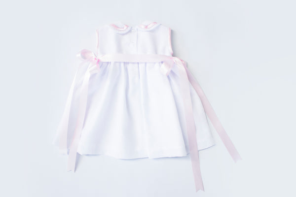 Vestido bordado color blanco con moños color rosa para bebé/niña| Carpi