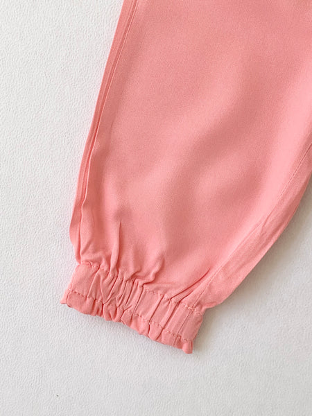 Pantalon con botones de madera color coral para bebe niña | LOSAN