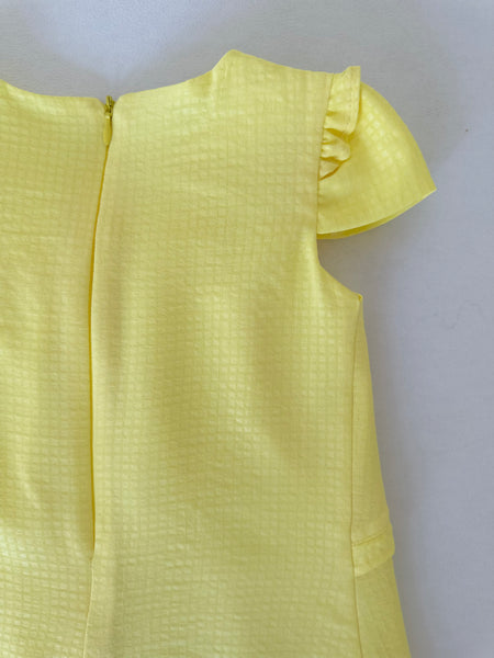 Vestido amarillo con olanes y lazo al frente con adorno para el cabello | Mexcana