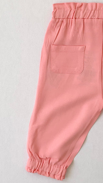 Pantalon con botones de madera color coral para bebe niña | LOSAN