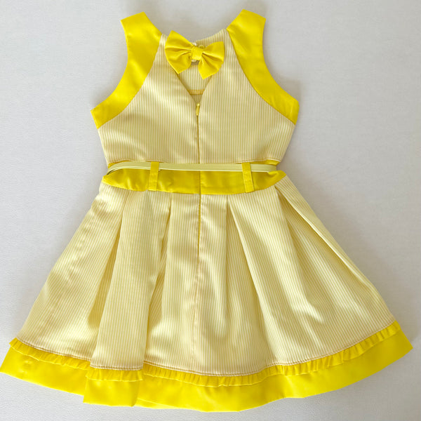 Vestido color amarillo con morral para niña | mexicana