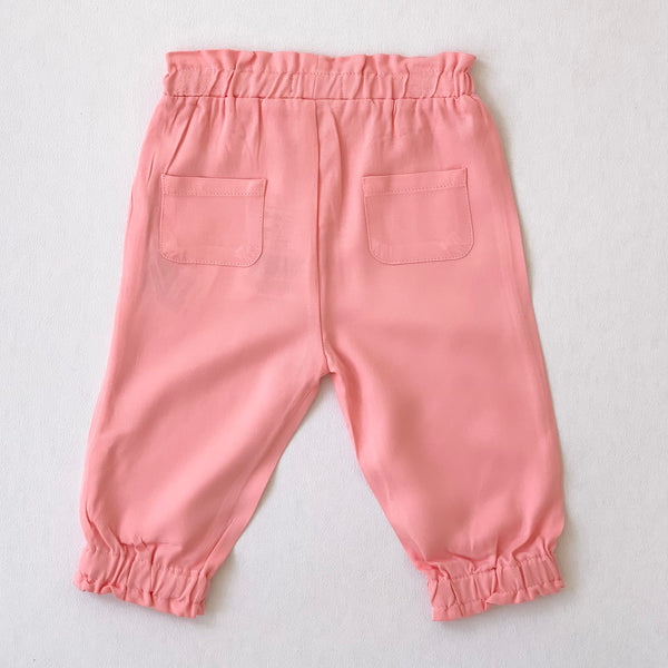 Pantalon con botones de madera color coral para bebe niña | LOSAN