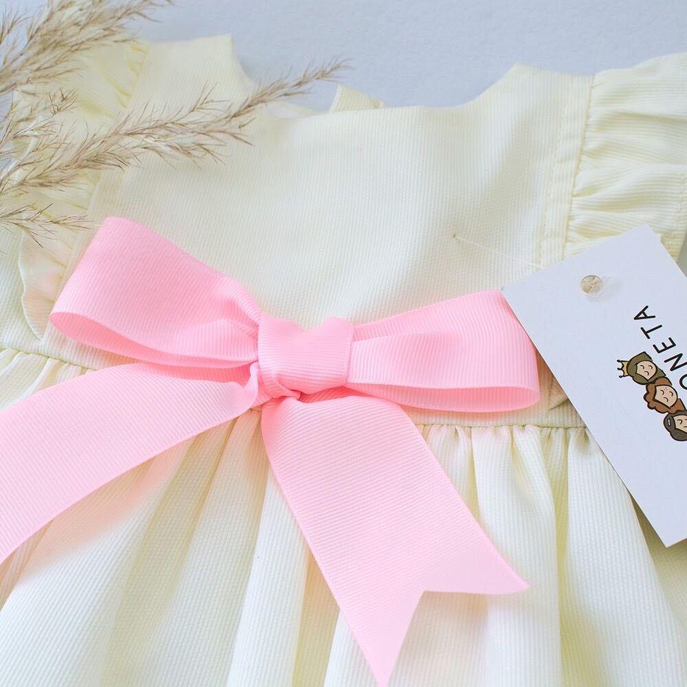 Vestido color beige amarillo con moño color rosa para bebé niña| Tina y Mar